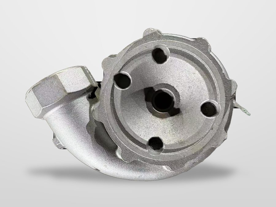 Sand-cast pump cover with machined spigot register