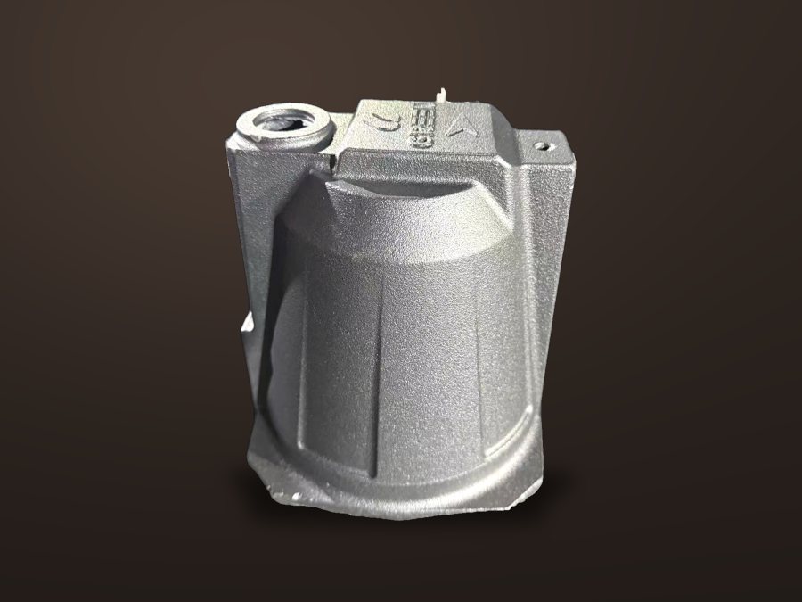 Jet pump casing on a dark studio background